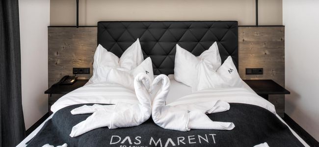 Komfortable Boxspringbetten in allen Zimmern, Suiten und Lofts.